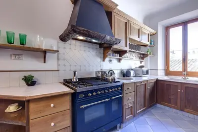 Cucina o angolo cottura di Pisana Apartment by Mamo Florence