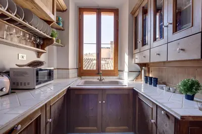 Cucina o angolo cottura di Pisana Apartment by Mamo Florence