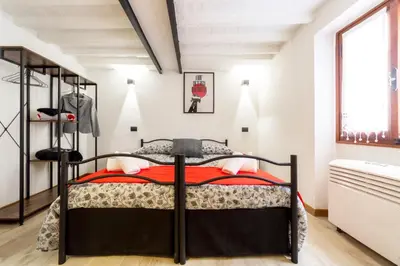 Letto o letti in una camera di La noce quiet place next to lively San Lorenzo