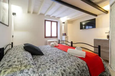Letto o letti in una camera di La noce quiet place next to lively San Lorenzo