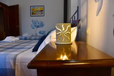 Letto o letti in una camera di Casa Pina