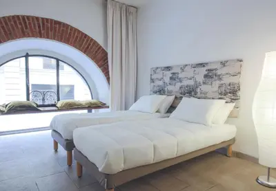 Letto o letti in una camera di Duomo Deluxe Apartment
