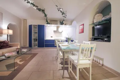 TV o dispositivi per l'intrattenimento presso Duomo Deluxe Apartment