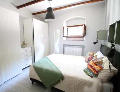 Letto o letti in una camera di Casa Margherita