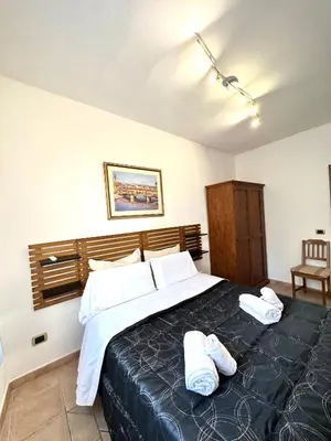 Letto o letti in una camera di Home Cavour Florence