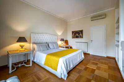 Letto o letti in una camera di YID D'Azeglio luxury apartment with parking