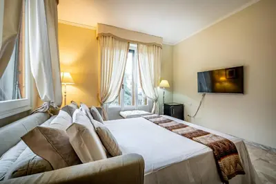 Letto o letti in una camera di YID D'Azeglio luxury apartment with parking