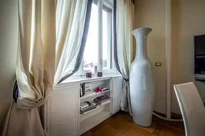 Cucina o angolo cottura di YID D'Azeglio luxury apartment with parking