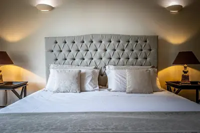 Letto o letti in una camera di YID D'Azeglio luxury apartment with parking