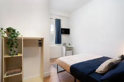 Letto o letti in una camera di Affittacamere Z&I Guesthouse