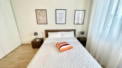 Letto o letti in una camera di Appartamento Leonardo