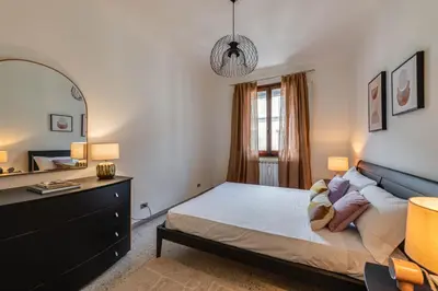 Letto o letti in una camera di Apartments Florence- San Marco Vasari