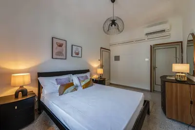 Letto o letti in una camera di Apartments Florence- San Marco Vasari