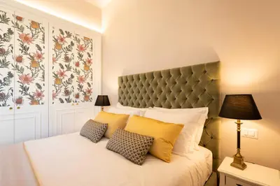 Letto o letti in una camera di Apartments Florence- Granduca Penthouse