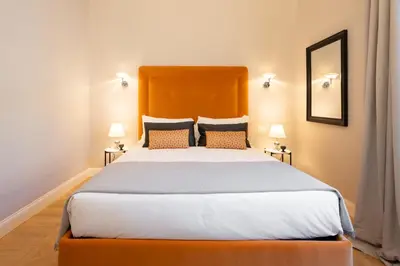 Letto o letti in una camera di Apartments Florence- Granduca Penthouse