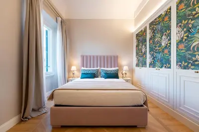 Letto o letti in una camera di Apartments Florence- Granduca Penthouse