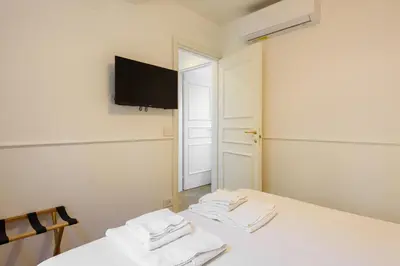 Letto o letti in una camera di Luxury San Niccolò by Mmega