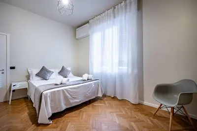Letto o letti in una camera di YiD Cairoli design apartment