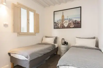 Letto o letti in una camera di Apartments Florence- Oltrarno Garden