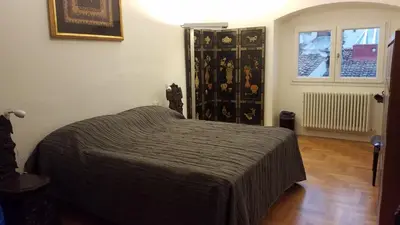 Letto o letti in una camera di De' Servi Suite al Duomo - Charming Italy Tour