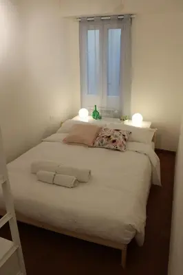Letto o letti in una camera di Friends of Michelangelo