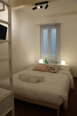 Letto o letti in una camera di Friends of Michelangelo