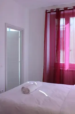 Letto o letti in una camera di Friends of Michelangelo