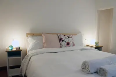 Letto o letti in una camera di Friends of Michelangelo