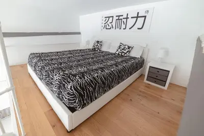 Letto o letti in una camera di Statuto suite
