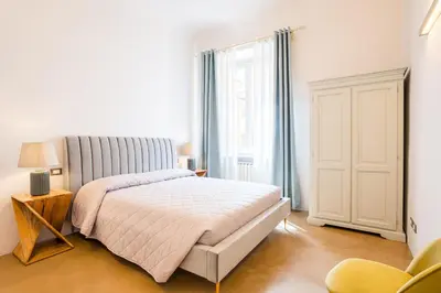 Letto o letti in una camera di Condotta 16 Apartments