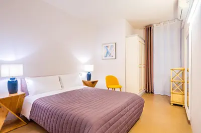 Letto o letti in una camera di Condotta 16 Apartments