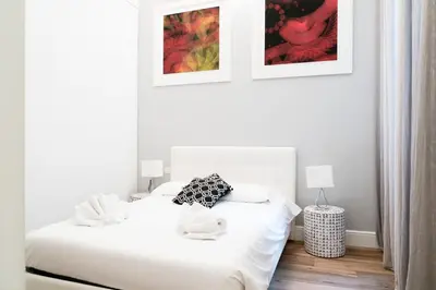 Letto o letti in una camera di Luxury Apartment - San Pancrazio, Florence