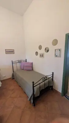 Letto o letti in una camera di Bilocale alla Ginestra