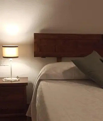 Letto o letti in una camera di Bilocale alla Ginestra