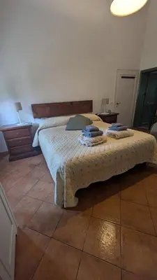 Letto o letti in una camera di Bilocale alla Ginestra