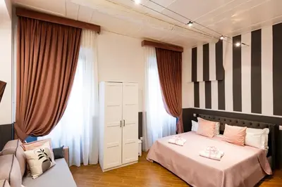 Letto o letti in una camera di Santa Croce Dream Suites