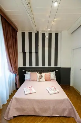 Letto o letti in una camera di Santa Croce Dream Suites