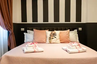 Letto o letti in una camera di Santa Croce Dream Suites
