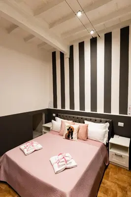 Letto o letti in una camera di Santa Croce Dream Suites