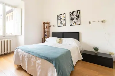 Letto o letti in una camera di San Benedetto Apartment