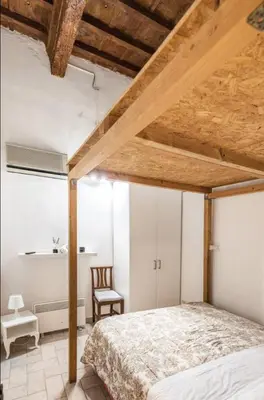 Letto o letti in una camera di appartamento centro Firenze