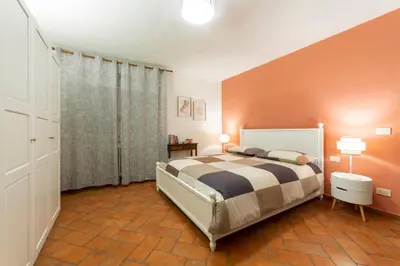 Letto o letti in una camera di Magnoli cozy flat two steps from Ponte Vecchio