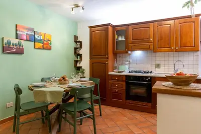 Cucina o angolo cottura di Magnoli cozy flat two steps from Ponte Vecchio