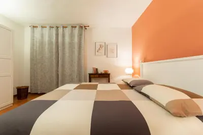 Letto o letti in una camera di Magnoli cozy flat two steps from Ponte Vecchio