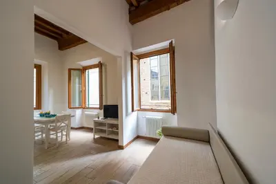 Letto o letti in una camera di Residenza Santa Croce
