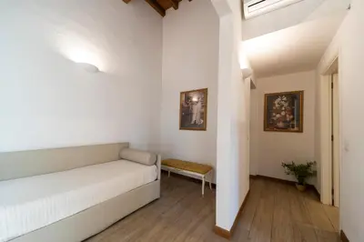 Letto o letti in una camera di Residenza Santa Croce