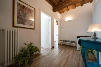 Letto o letti in una camera di Residenza Santa Croce
