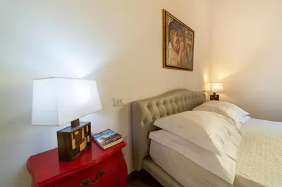 Letto o letti in una camera di Residenza Santa Croce