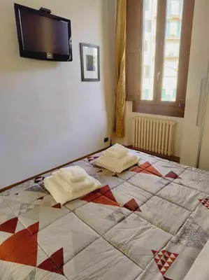 Letto o letti in una camera di Dimora La Terrazza Di Careggi