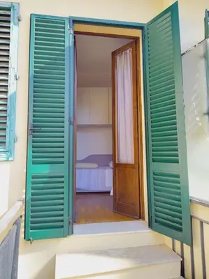 Letto o letti in una camera di Dimora La Terrazza Di Careggi